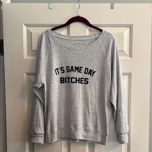 Gray Sweatshirt with Black Text
